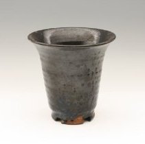 Bowl with parallel incised design, black by unknown